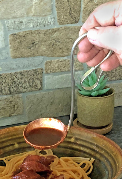traditional copper sauce ladle