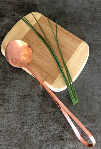 copper tasting spoon