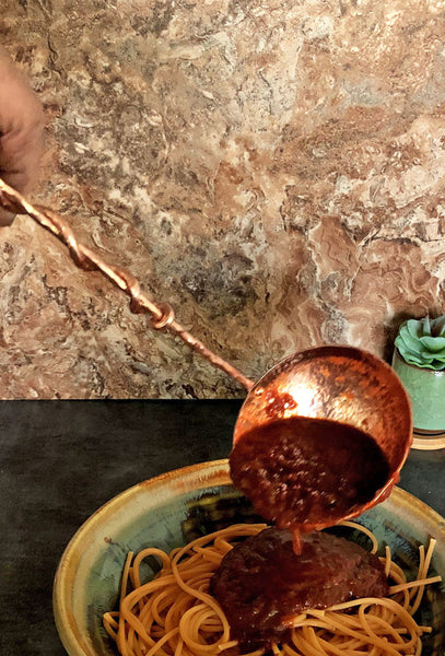 large copper ladle