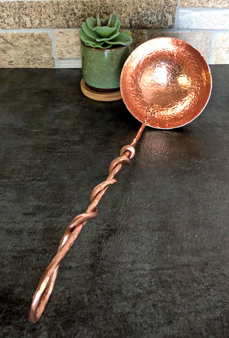 large copper ladle