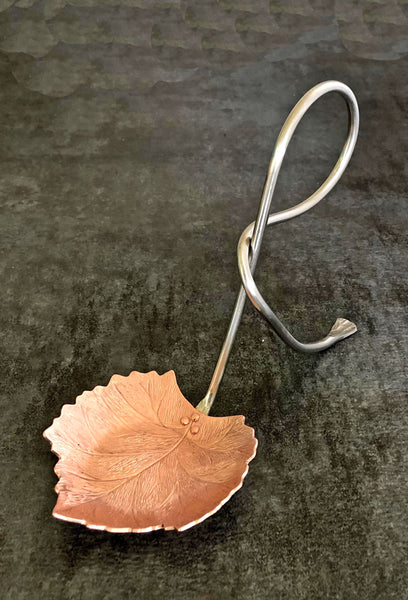 copper grape leaf candle holder with German Silver handle